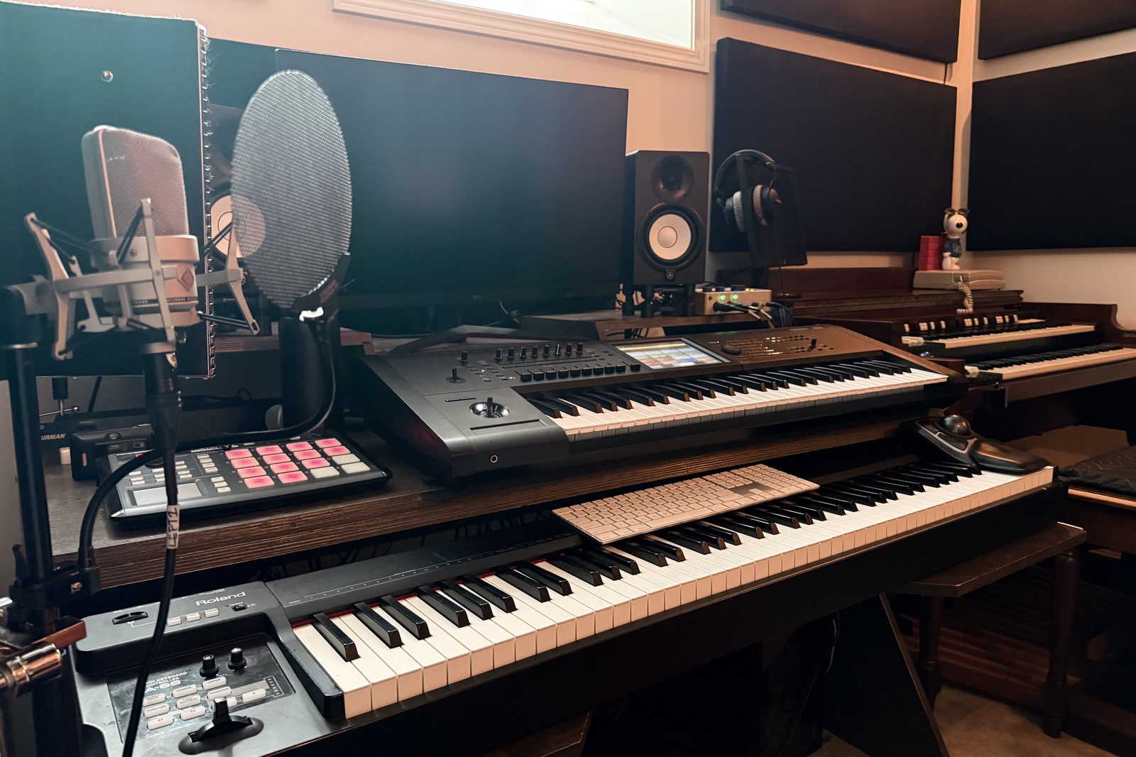 Recording setup in the Music with Nick studio — condenser microphone, MIDI keyboards, monitor speakers, headphones